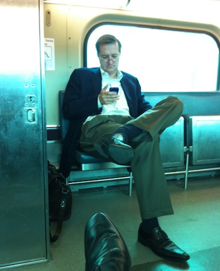 Illustration for article titled A Dejected Tom Ricketts Rides The Train